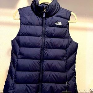 North Face Super Cute Brand new puffer vest . Never worn with tags
